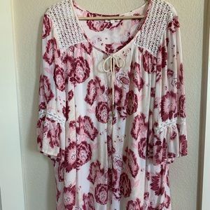 Billabong blouse. Floral with tie at neck. Size unknown. Fits loosely.